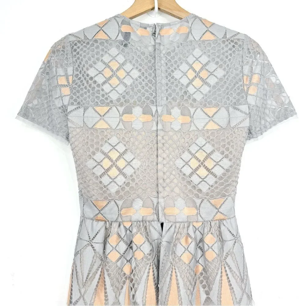 BCBGMAXAZRIA Light Dusk Contemporary Geometric Lace Mesh Overlay Peplum Blouse